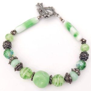Green glass and antique silver beaded bracelet